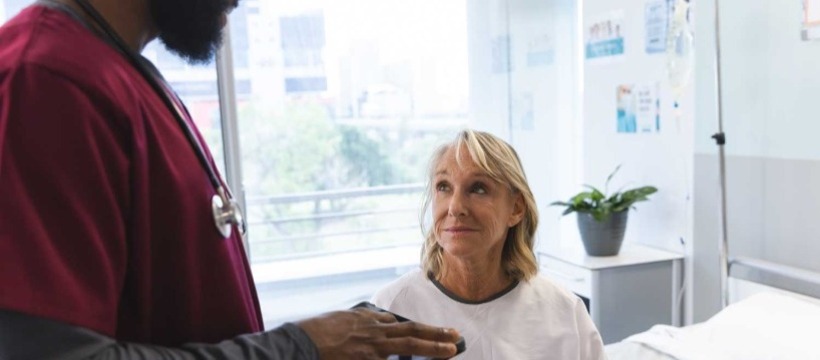 Doctor smiling with patient